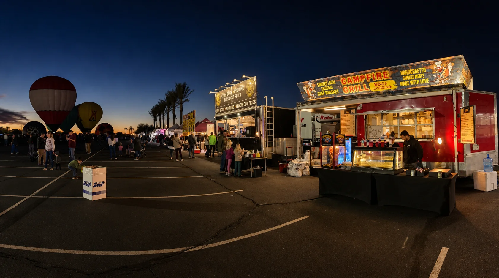 Sixon food trucks at a night event with hot air balloons