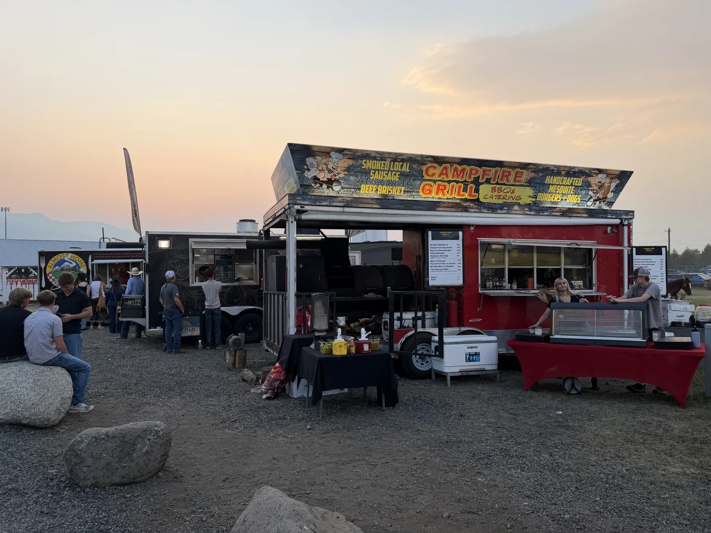 Campfire Grill lined up with other food trucks at sunset at Chief Joseph Days Rodeo