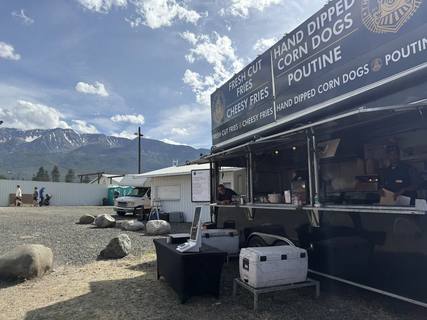 The Gravy Train open for service with snow-capped mountains behind at Mountain High Broncs & Bulls