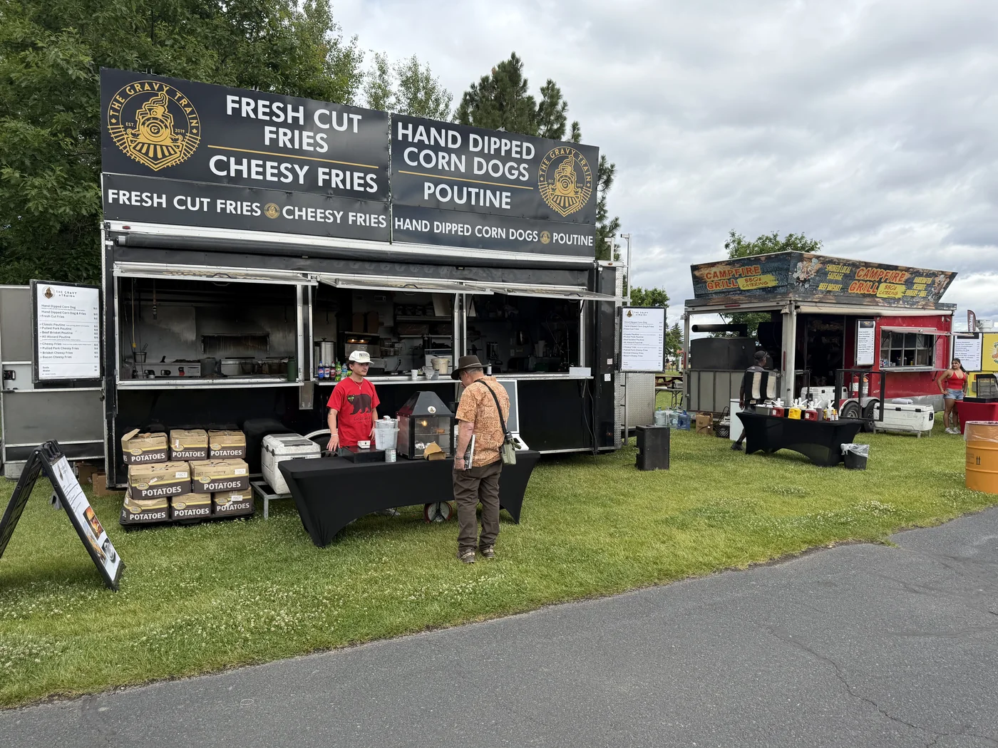 Both Sixon trucks lined up at Overland Expo PNW in Redmond, Oregon