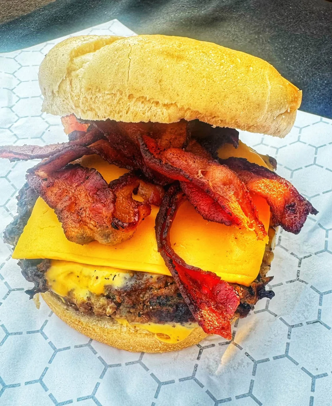Bacon cheeseburger with melted cheese
